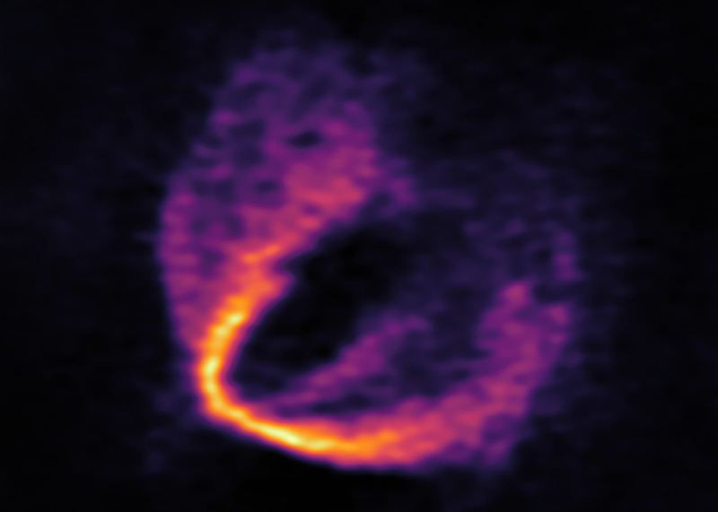 ALMA image showing a “kink” in the wavelength of flowing gas within the protoplanetary disk in orbit around infant star HD 163296.